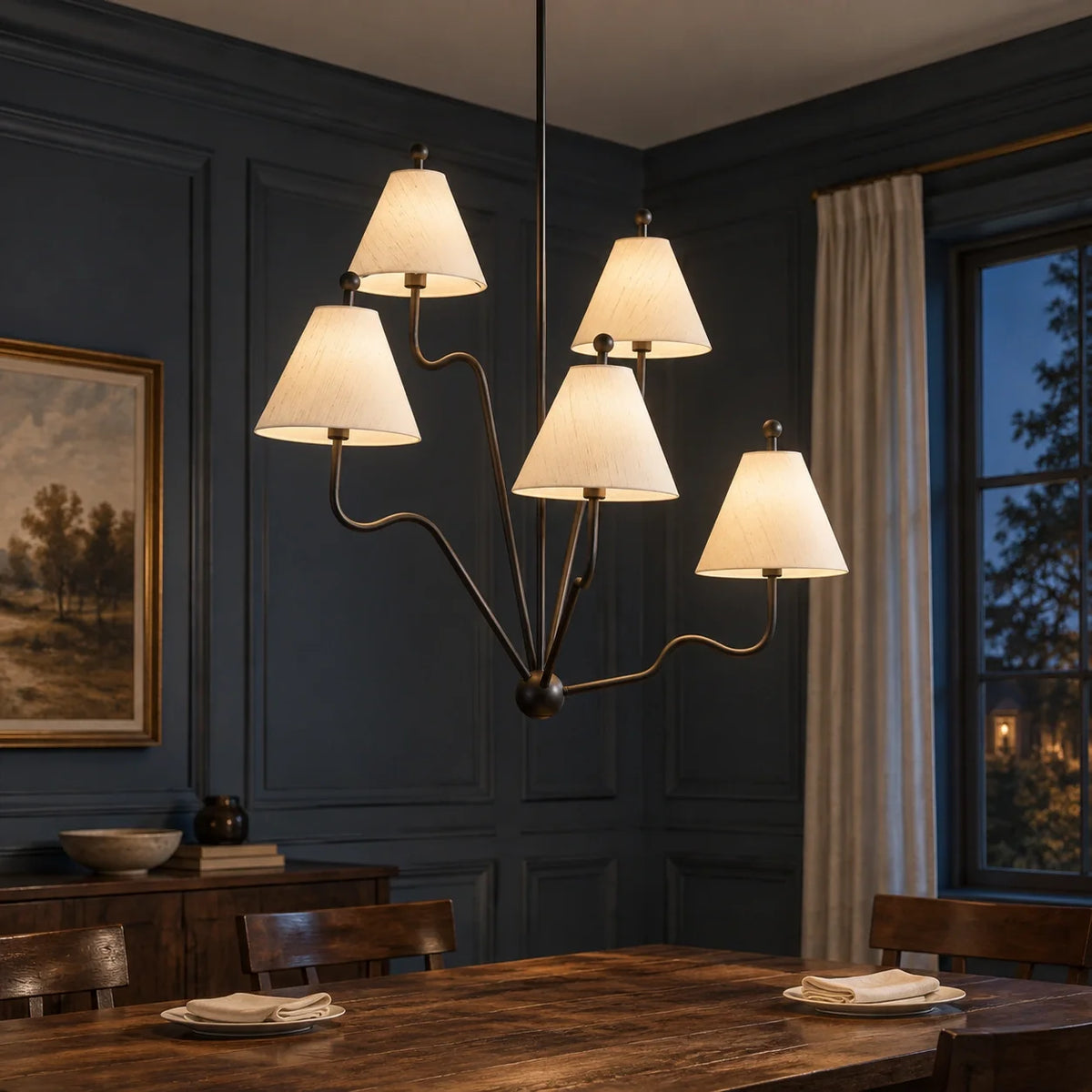 Isolde black silk shade chandelier above a night supper table