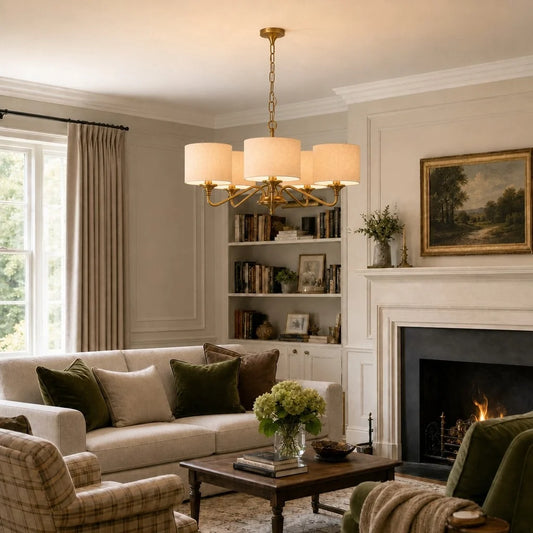 Living room with beige sofa, coffee table, and chandelier.